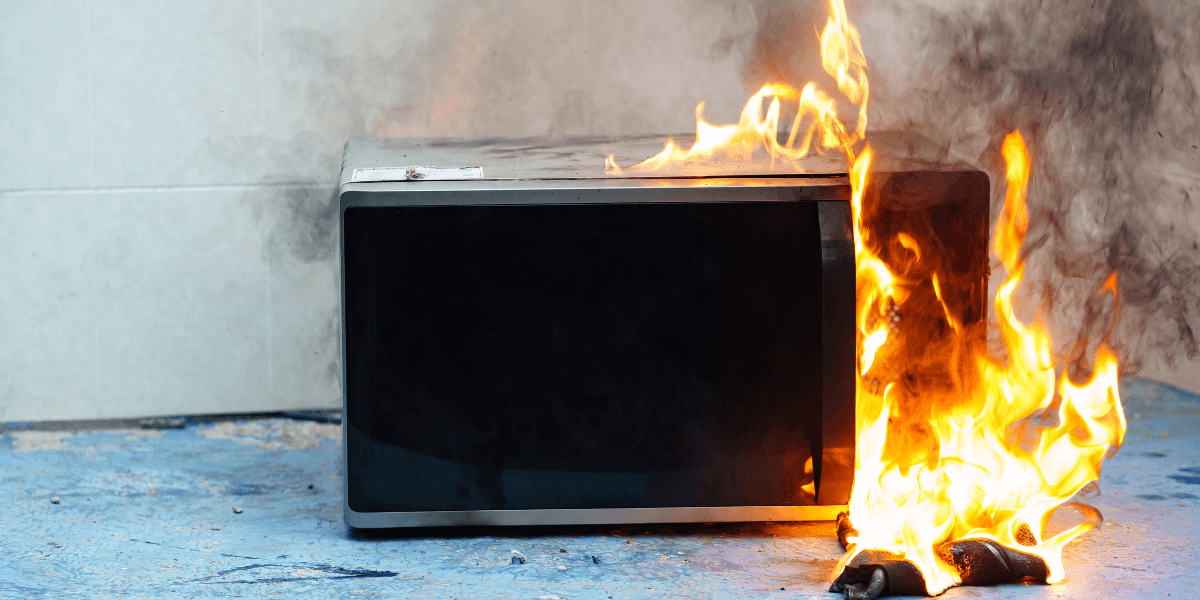 A microwave oven on fire